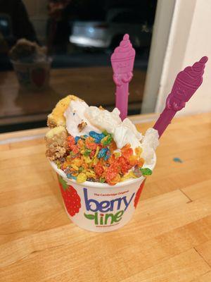 Original tart and strawberry froyo with fruity pebbles, mochi, and cheesecake