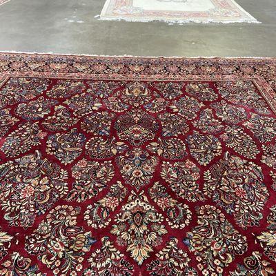 Our palace sized antique rug was not a problem for Ahmadi to move & clean!