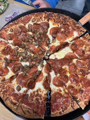 Pepperoni and sausage pizza