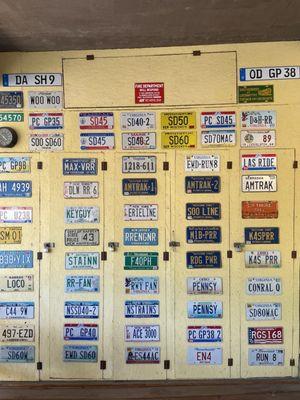 License plate wall on the front porch