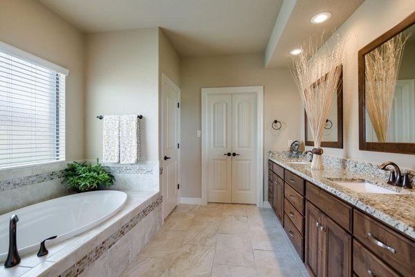 Master Bath with his and her's sinks and garden tub. Beautiful granite counter tops.