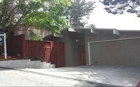 Our front gate that encloses our courtyard that Louey built.  He also engineered the concrete planter in front of the fence.