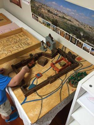 Jerusalem as it was when Jesus walked the streets.  The child puts the entire city together in the Atrium