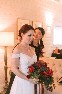 Doing the finishing touches on hair before she walks down the isle