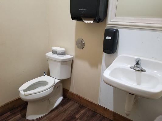 Two unisex restrooms. One has a diaper station.