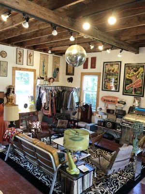 Another view of the modern side of the store.  A glimpse of our radio collection and our sci-fi movie posters and our '64Wurlitzer juke box.