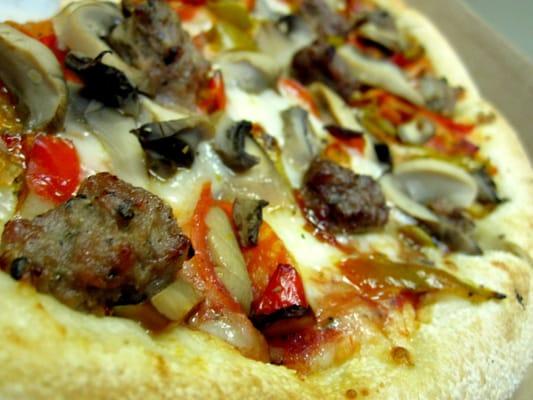 House Special Pizza (peppers, onions, mushrooms, pepperoni, ground beef, sausage)