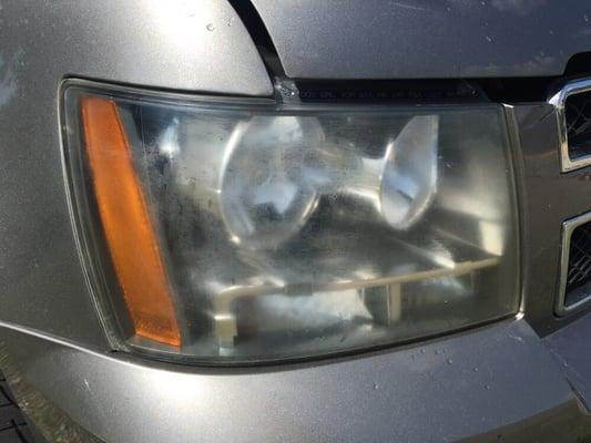 This is the headlight on a 2007 Chevy Tahoe before restoration