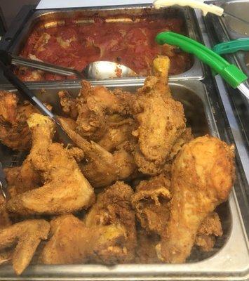 Fried chicken on the steam bar.