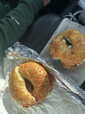 Asiago bagels with bacon, egg, tomato and cheese and the other has chive and scallion spread (I couldn't wait to take a bite )