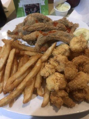 Shrimp, catfish filet, and fries