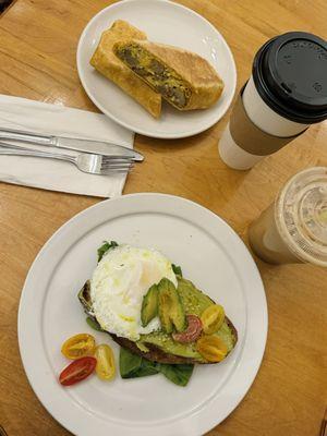 Sausage breakfast burrito, avocado toast with egg, & lattes