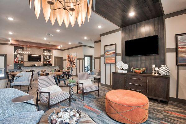 a living room filled with furniture and a tv at Sterling Creek