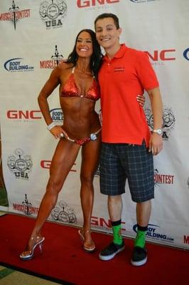 Coaching a bikini competitor at NPC muscle contest in Los Angeles.