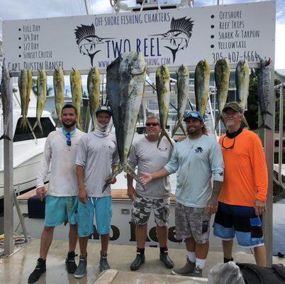 Captain Dustin, crew, & 2 happy charter guests!!