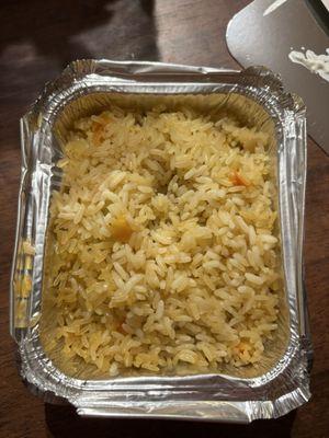 Rice was hard. The corners were stuck to the container and inedible.