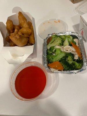 Small portion of sweet-and-sour chicken and chicken and broccoli, and a white sauce. Yumm!