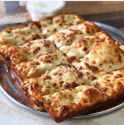 This crowd favorite is loaded with mozzarella cheese and  topped with garlic butter and Parmesan cheese. Comes with ranch or marinara sauce.