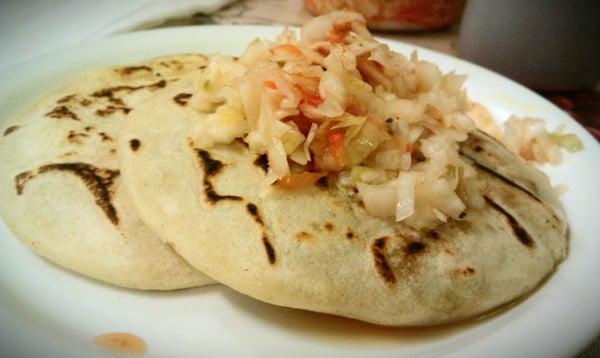 Pupusa revuelta and flower