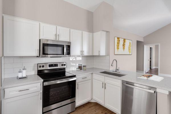 Kitchen with stainless-steel appliances at The Links at Plum Creek in Castle Rock, CO