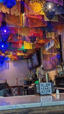 Behind the bar is colorful!