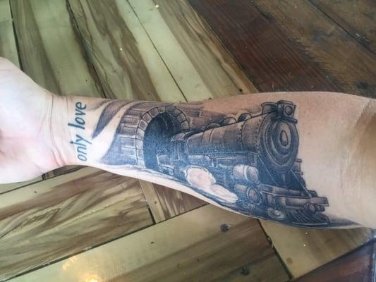 Most recent tattoo of a train by Steve.