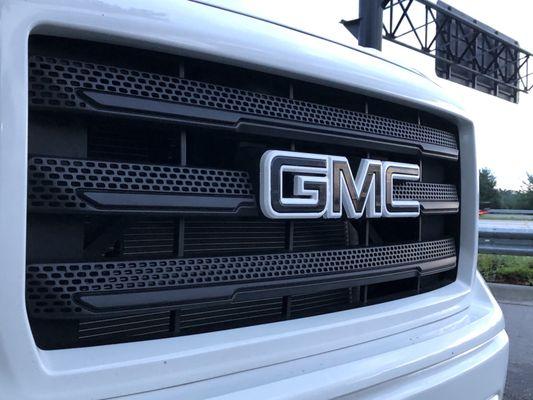 Matte black wrapped grill with glossy black and white trim!