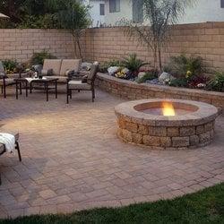 Relax by the fire pit on a paver patio