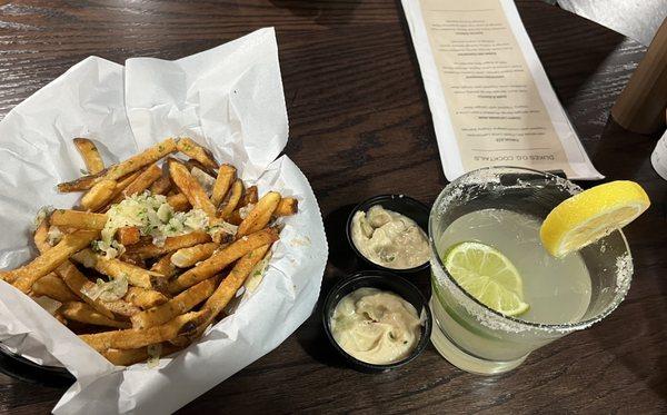 Truffle fries with garlic aioli, and Lemontini margarita. Recommend it all!