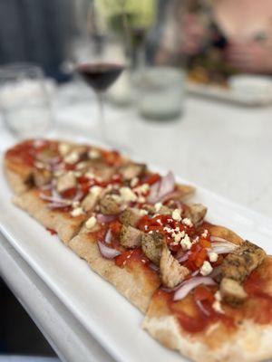 Greek flatbread with added chicken -$25