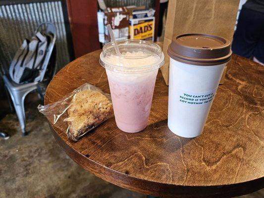 Italian soda with huckleberry and vanilla, cherry almond vanilla scone, and oatmilk latte