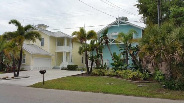 These two beauties are Key West style homes that we designed and built.