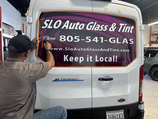 Adding decals to our new electric transit vans