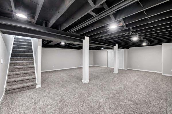 Newly updated basement with exposed ceilings!