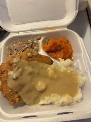 Country fried steaks , mash , yams , black eyed peas