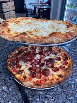 3 cheese (top) and pepperoni (bottom) pizza