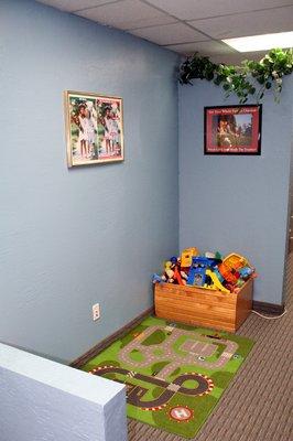 Our smaller patients have their own reception area to have a little fun before & after their adjustments.