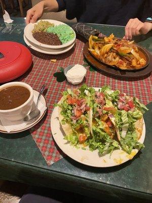 shrimp tacos, black beans, steak and shrimp fajitas