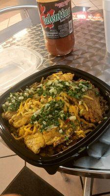 Now serving Spanish Bowls. This was yellow rice, black beans, picadillo, tostones, cheese and chimicuri sauce. It was also delicious!