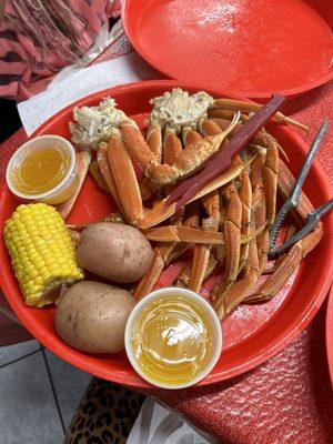 Snow crab legs potatoes corn melted butter