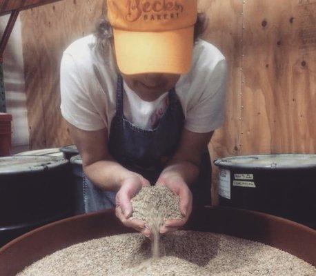 Here's the owner Rhonda appreciating some grain fresh from the farmer!