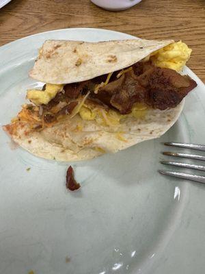 Half eaten Breakfast Taco