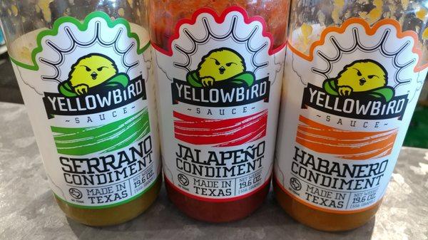 A variety of Yellowbird sauces