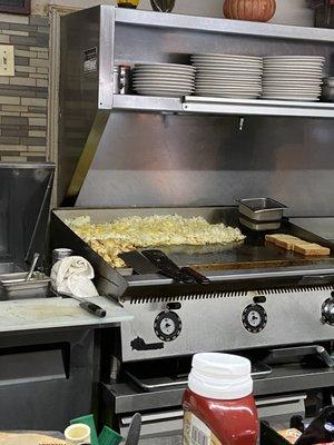 Hash browns on the grill.