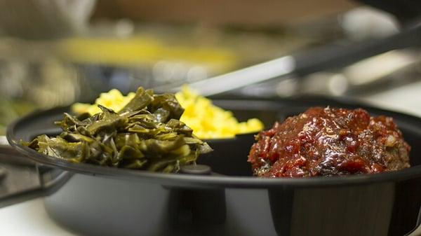 Beef meatloaf w/ signature glaze, greens, and rice pilaf