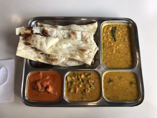 $7 lunch. Fresh butter naan, 2x's the garlic & ginger dal, veggie korma, butter chicken. YUM!!!!!