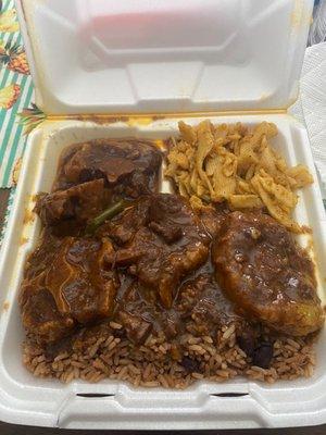 Ox tail, Mac and Cheese, Rice and Peas