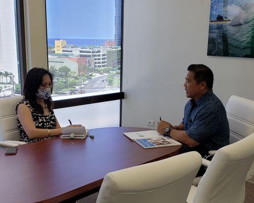 Agent Mark Faildo being interviewed by Diane Ako from KITV for one of her "Aging Well" weekly news segments