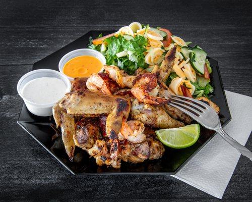 Blackened wings and shrimp .well seasoned .
Side chef salad .