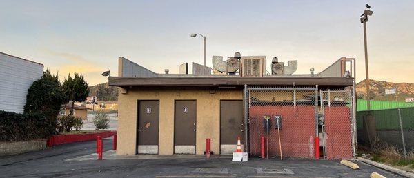 View from the parking lot in the back, exterior restrooms